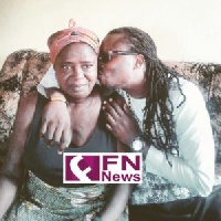 Richard Kwasi Siaw Afrofi aka Ex Doe with his mother