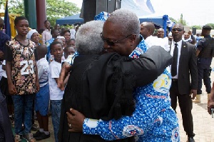 Mahama hugs his critic Martey