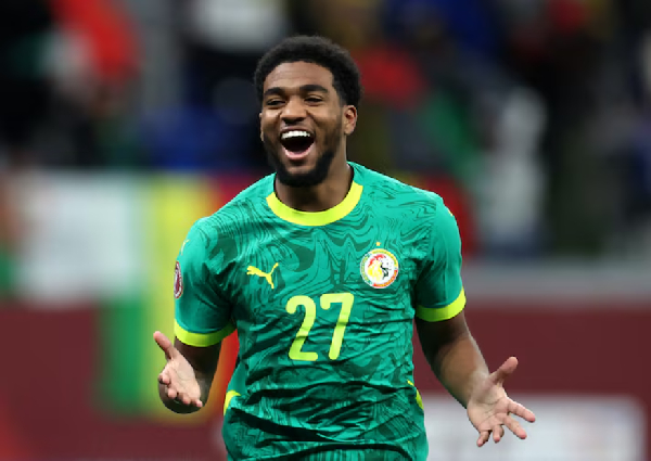 Senegal's Ibrahim Mbaye celebrates scoring their third goal during AFCON round 16