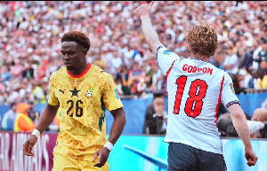 Black Stars defender Marvin Senaya (L) defended well against Anthony Gordon