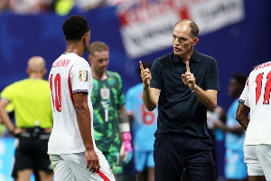 Real Madrid midfielder Jude Bellingham (L) and Three Lions coach Thomas Tuchel