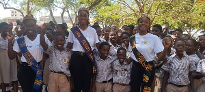 Miss Tourism Ghana representatives with some pupils