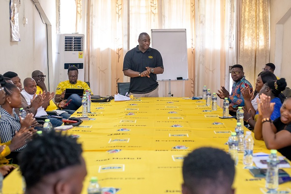 MTN employee volunteers training beneficiaries on customer service and financial literacy skills
