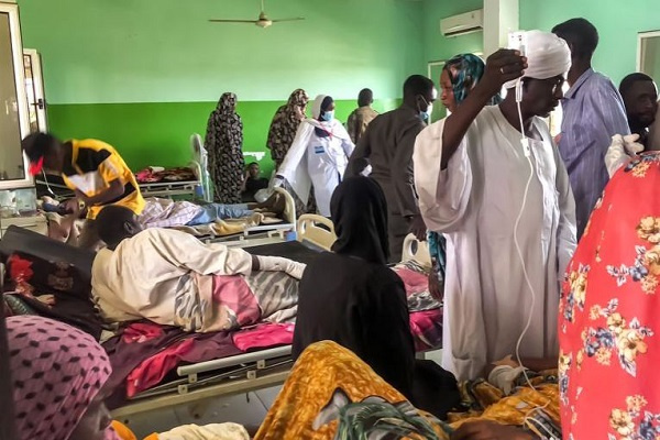 A ward at a hospital in el-Fasher in North Darfur is crowded with people wounded