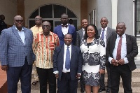Minister of the Interior, Ambrose Dery with nine-member Auctioneers Registration Board