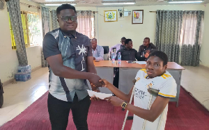 A person with disability seen receiving an envelope