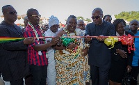 President Mahama and Gbese Mantse cutting tape to inaugurate the new school