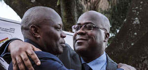 DRC opposition leader of the UNC party Vital Kamerhe (left), hugs Felix Tshisekedi of the UDF party