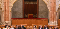 Chair of  Tamas Sulyok sits empty as Parliament votes on a constitutional amendment, on July 13