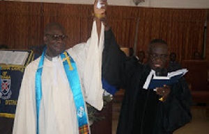 Rev. Roy Asiamah (left) being inducted by Rev. Michael G. Anim-Tettey