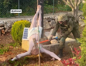Isreali Soldier Smashing Jesus Statue .png