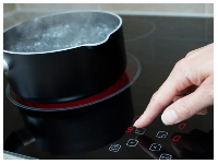 Induction cookers use electromagnetic energy to heat compatible cookware directly