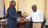 Prof Alex Dodoo (left) congratulating Dr Asamoa-Baah