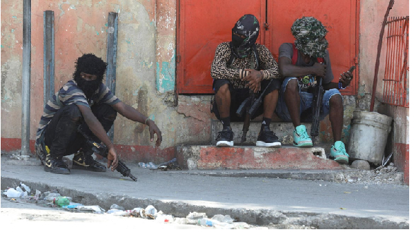 Gang members sit together