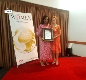 Chief Medical Director of the Family, Child & Associates, Dr. Juliet M. Tuakli receiving an Award