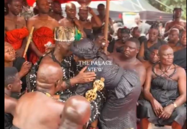 former First Lady of Ghana, Nana Konadu Agyeman-Rawlings hugging Otumfuo Osei Tutu II