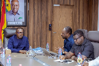 Minister for Energy, Dr John Abdulai Jinapor (M) and Managing Director of TOR, Edmond Kombat (R)