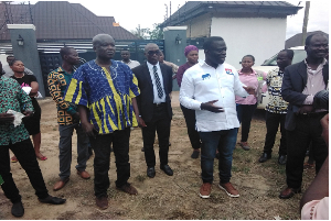 Ignatius Baffour-Awuah (white) at a project site