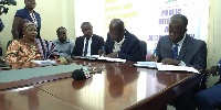 ACP K.K. Amoah (extreme right), Exec Dir. of EOCO and Dr Steve Manteaw, (2nd right) signing