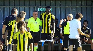 Referee pose with Sulley Muntari ahead of game