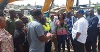 Mr Amoako-Atta (right) interacting with engineers at one of the project sites