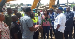 Mr Amoako-Atta (right) interacting with engineers at one of the project sites