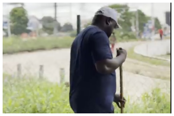 MCE for Asokwa, Amoh Kamel, leading a clean-up exercise