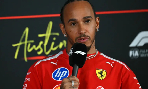 Ferrari's Lewis Hamilton speaks at a news conference ahead of the US Grand Prix