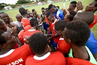 Ghana Black Stars captain Asamoah Gyan with the Liberty team after the game