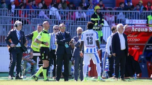 Ghana's Sulley Muntari walked off the field after racial abuse in Italy