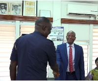 Mr. Miicheal Luguje (R), with the Tema Regional Police Commander, DCOP Nana Asomah (L)