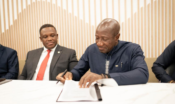 Sam George (Left) during the signing ceremony with MTN Ghana