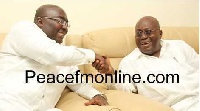 Vice President, Dr Mahamudu Bawumia in a handshake with President Nana Akufo-Addo