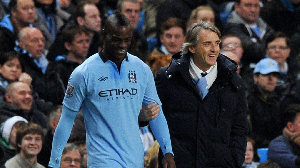 Mario Balotelli and Roberto Mancini