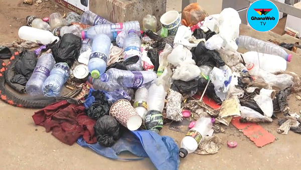 A part of the footbridge captured with heaps of rubbish