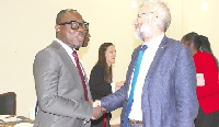 Prof Ransford Gyampo (left) interacting with Mr Paolo Salvia (right), Acting Head of the delegation