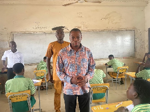 Kingsley Nyarko interacting with students at one of the examination centers in his constituency