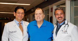 Patient Tim Andrews (centre) with Dr Tatsuo Kawai (left) and Dr Leonardo Riella (right)
