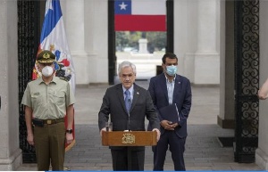 Chile's Presidency of President Sebastian Pinera (C) announcing the resignation of Chilean police