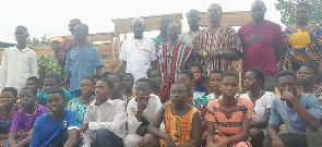 A group picture of Chiefs and BECE candidates of Ekpoku-Tandan