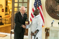 Ambassador Robert Jackson presenting the award to Prof. Gyima-Boadi