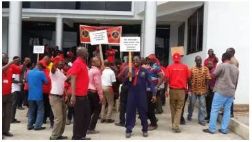This file photo shows some ECG workers demonstrating  to show their displeasure
