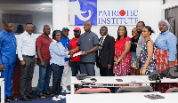 The Patriotic Institute receiving financial donation from the USA branch of the NPP