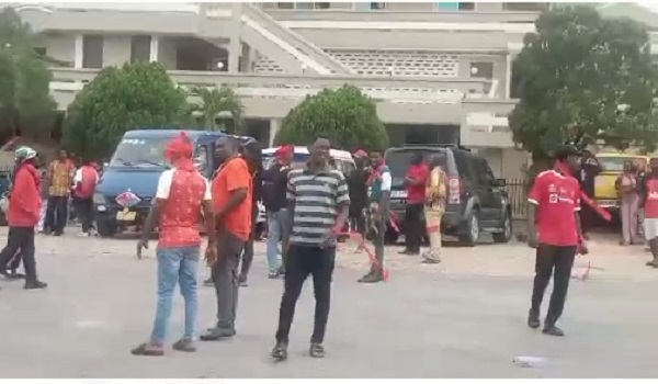 Some NDC supporters at the police station