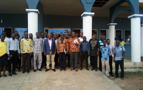 Ing. Dr. Arthur (Middle) in a picture with staff at the Akrofuom District Assembly