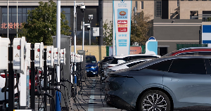 Electric vehicle charging stations are seen in Beijing, China, 11 October 2024