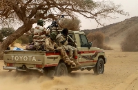 Niger soldiers patrol in the desert of Iferouane