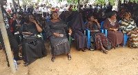Barbara Mahama, wife of the lynched soldier is the one who has covered her face with a black veil