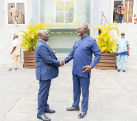 Dr Mahamudu Bawumia and Kennedy Agyapong in a handshake