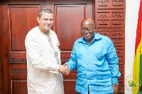Dr. Xavier Crespin, shaking hand with President Nana Addo Dankwa Akufo-Addo